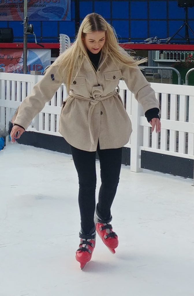 One Woman skating.