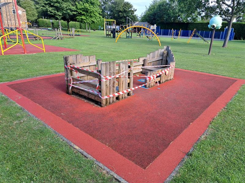 Taped off play equipment at Richmond Park