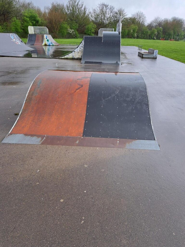 Small ramp, half section resurfaced, the other the wooden surface.