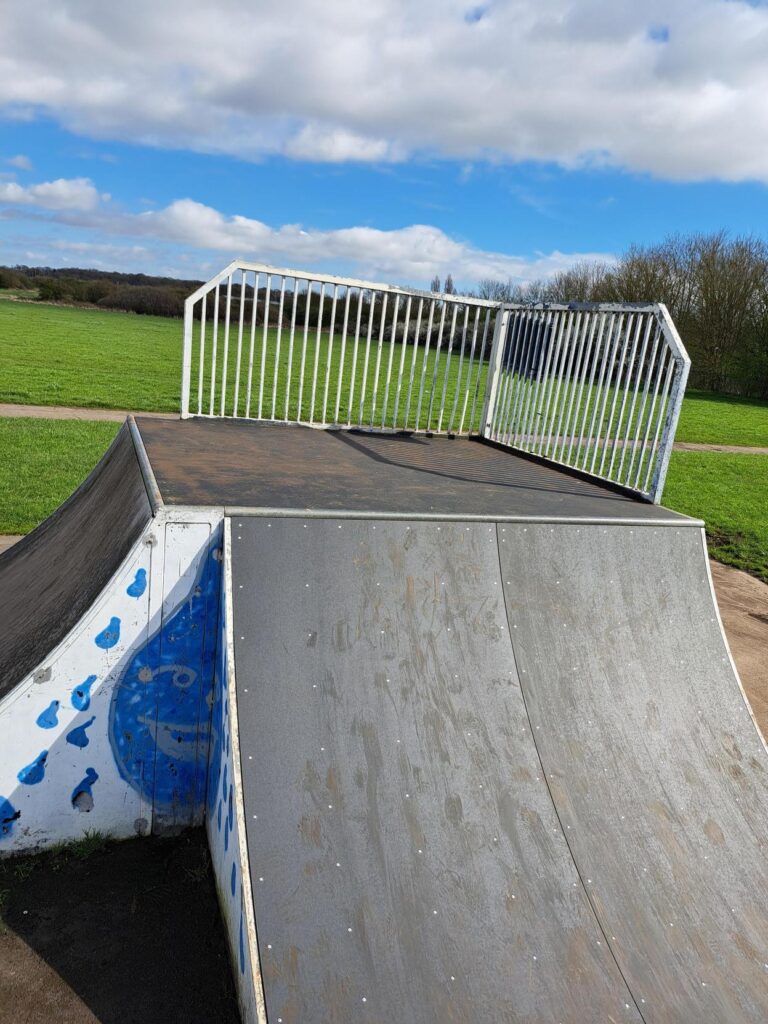 Photo of the corner skate ramp with new surface. 